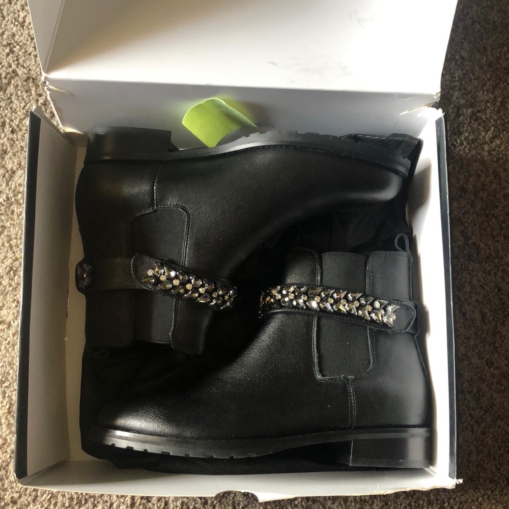 Brand new in box! Never worn. Super cute boots with gems!!